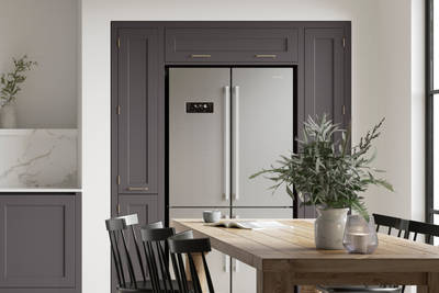 Integra Ludlow in shades Cashmere Sweater and Charcoals, a contemporary take on a Shaker kitchen, where the premium frontal features panelled doors with integrated handles.