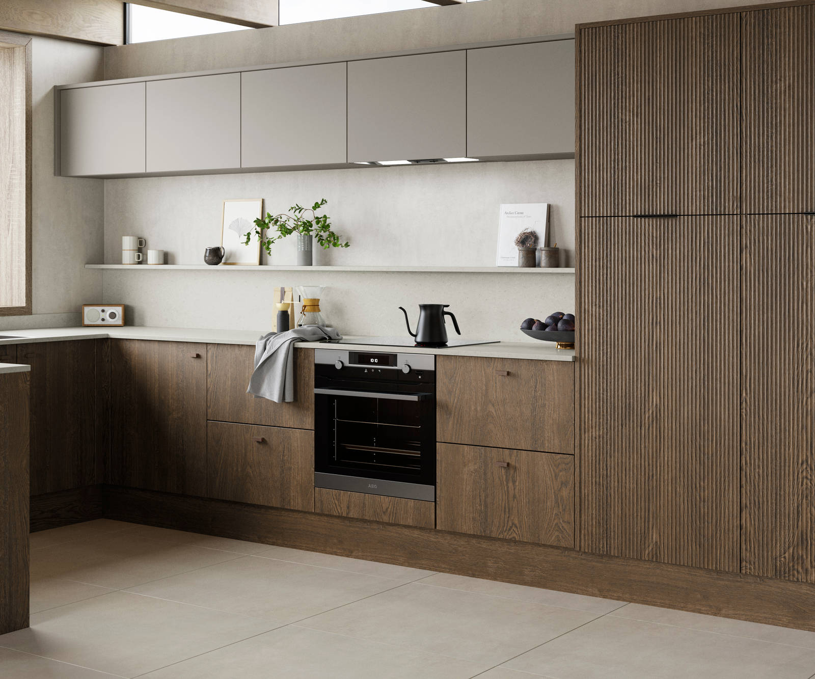 Magnet Kitchens 2021 Nordic Nature range with Fluted oak doors and Integra Hoxton Pebble cabinets with Dekton Aeri worktop. U-shaped kitchen with breakfast bar area.