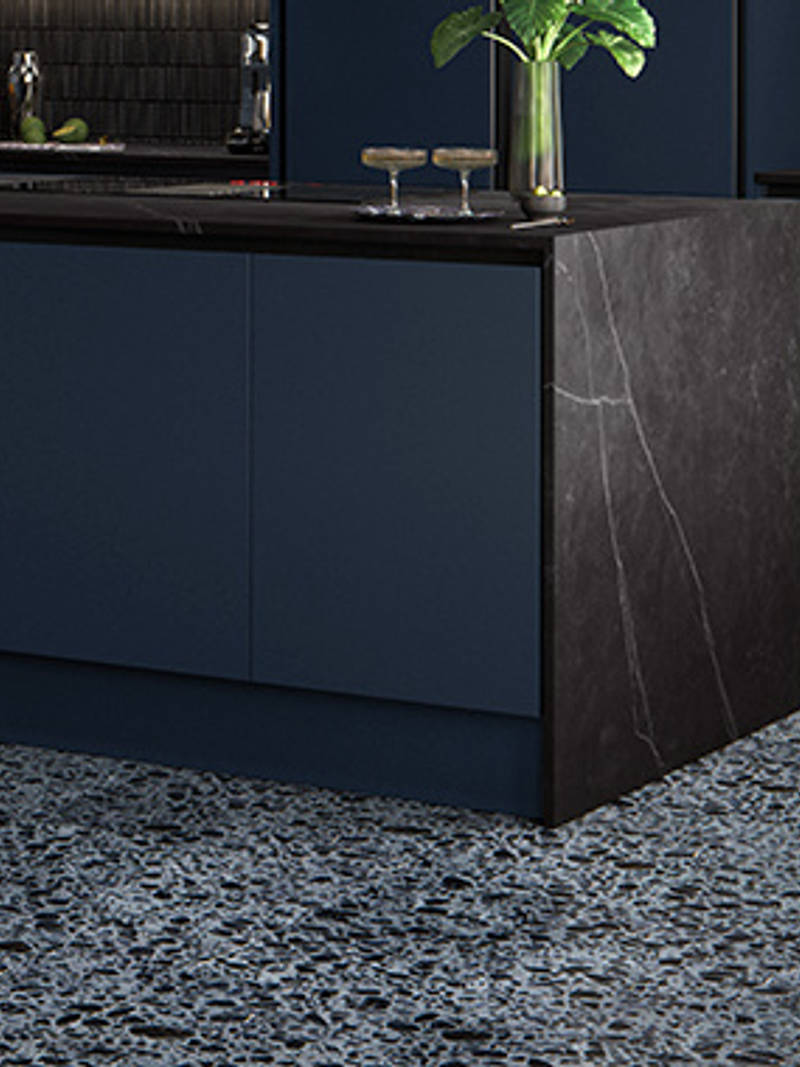 Integra Hoxton Kitchen from Magnet available in metallic midnight blue. Smooth slab doors and a painted effect finish.