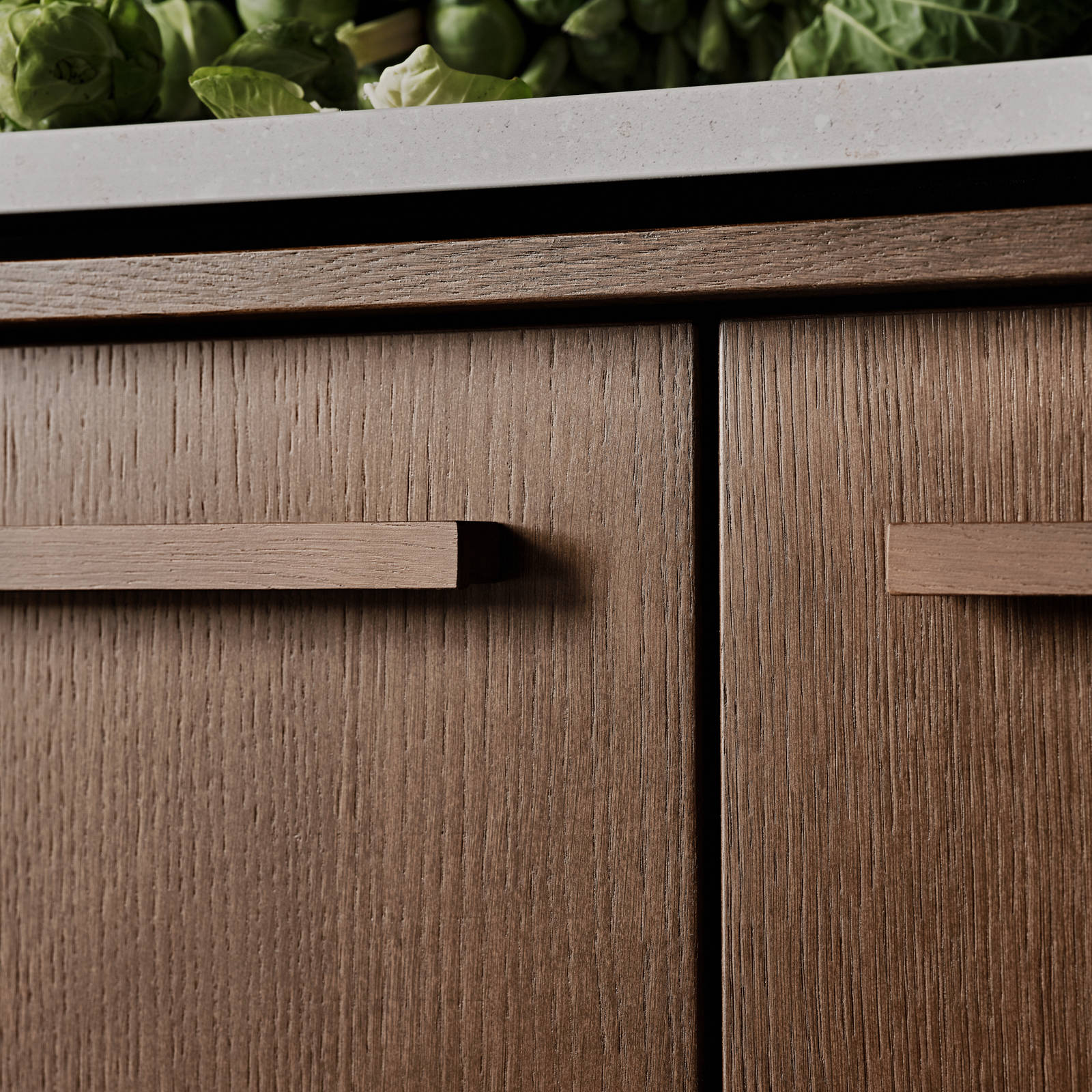 Be naturen inn og la de organiske formene møte hverdagen i Signatur Favn – et grenseløst kjøkken med naturens former i fokus.