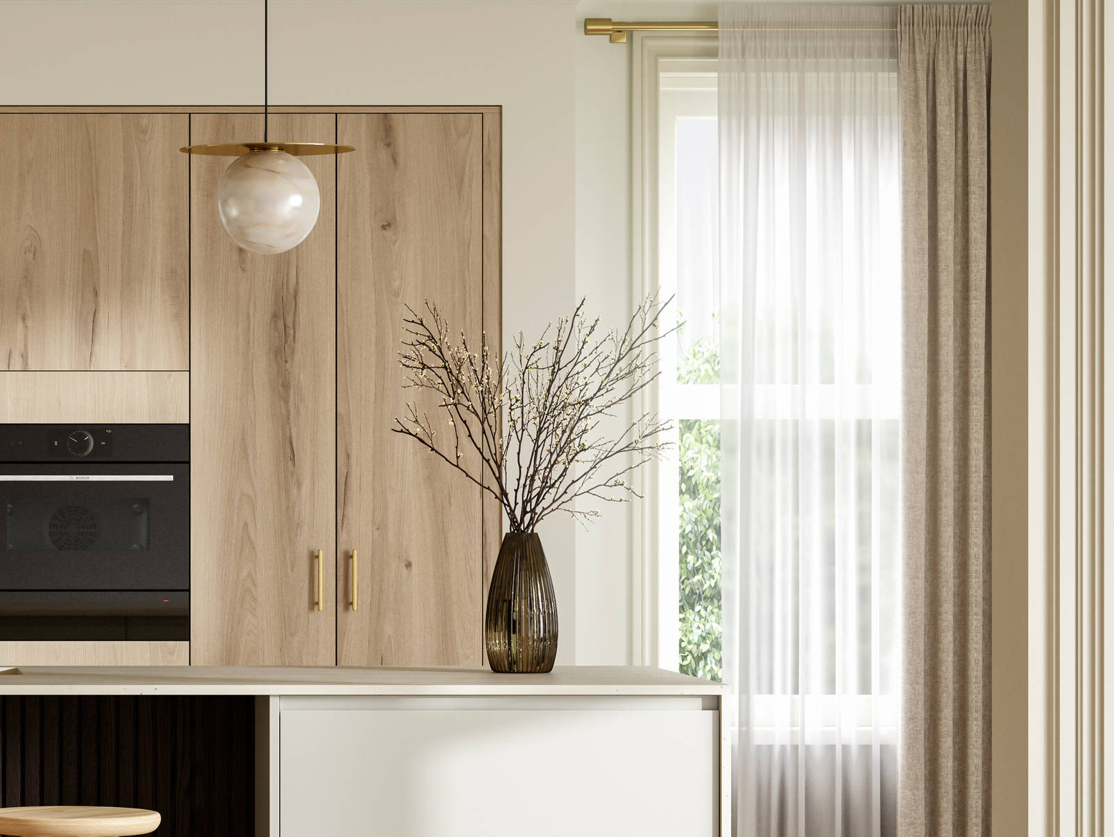 A bright and airy open-plan kitchen that incorporates Duxbury drawers and cabinets in Limestone, and Portobello units in Bosco.