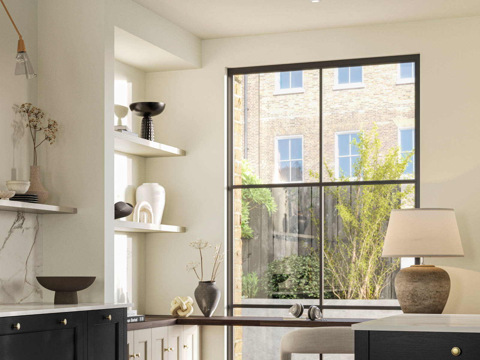 Traditional Shaker-style tactile woodgrain Ludlow Sumi Black kitchen with kitchen island, light and airy with brass accessories, marbled white and grey worktop, home office area by full height windows and Amtico oak stripwood vinyl flooring.