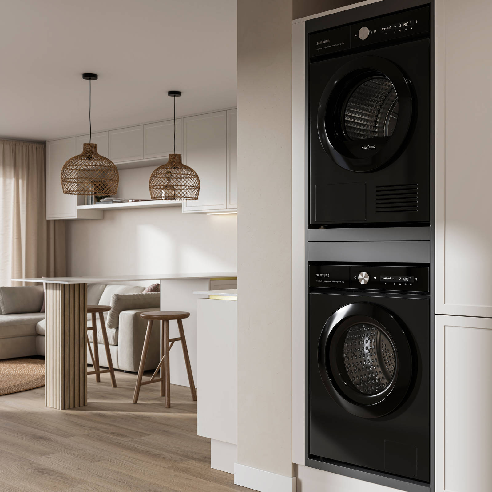 View from utility room with integrated washing machine and tumble dryer of handleless Wabi sabi inspired Integra Brunswick Limestone kitchen combined with living area, wood barstools for breakfast bar, natural materials, Euros oak flooring.