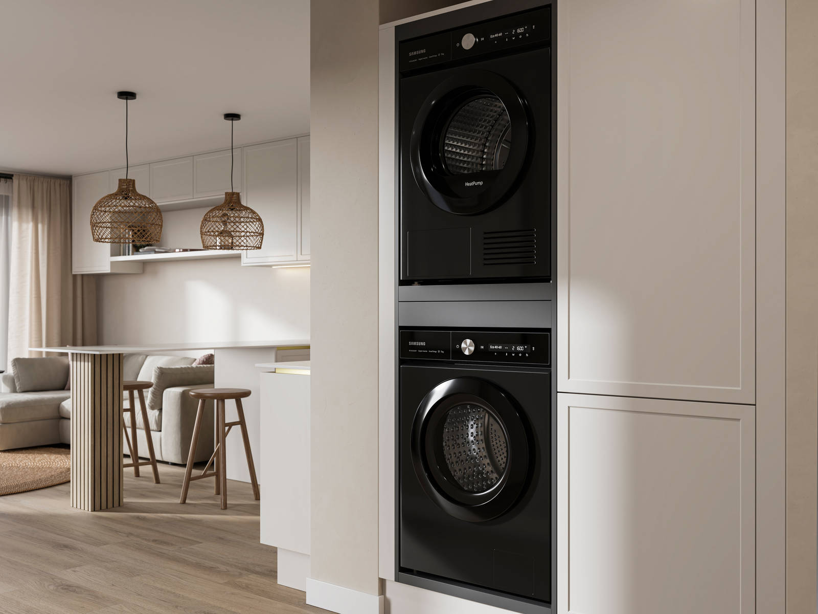 View from utility room with integrated washing machine and tumble dryer of handleless Wabi sabi inspired Integra Brunswick Limestone kitchen combined with living area, wood barstools for breakfast bar, natural materials, Euros oak flooring.