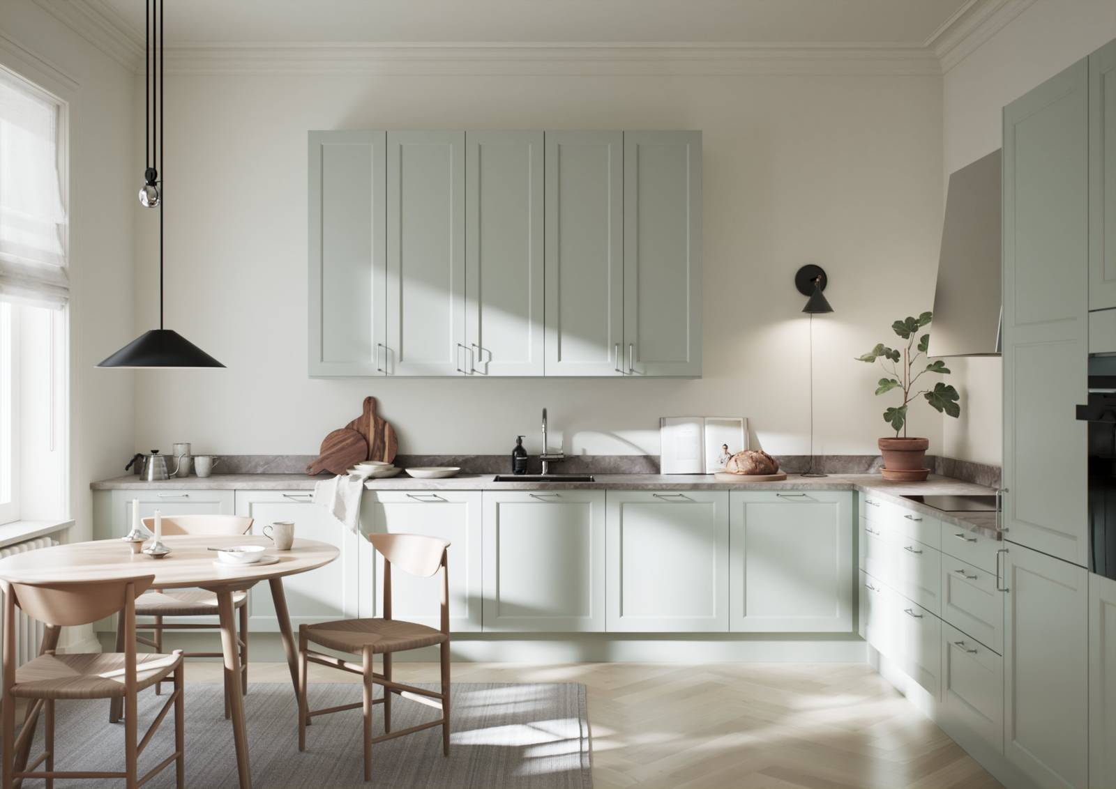 Tidløs lingrønn kjøkken som har en 5-delt speilfront med profilert innerkant og slett speil, stål håndtak og kran, grå marmor benkeplate med spisebord og stoler i lys tre.
