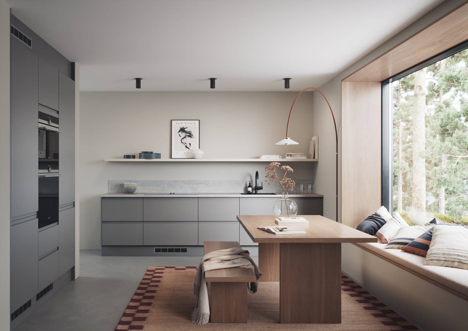 Mellomgrå kjøkken med integrerte grep, før en innredninsløsning som er lineær og grafisk velskapt, med tre spisebord och sittbænk