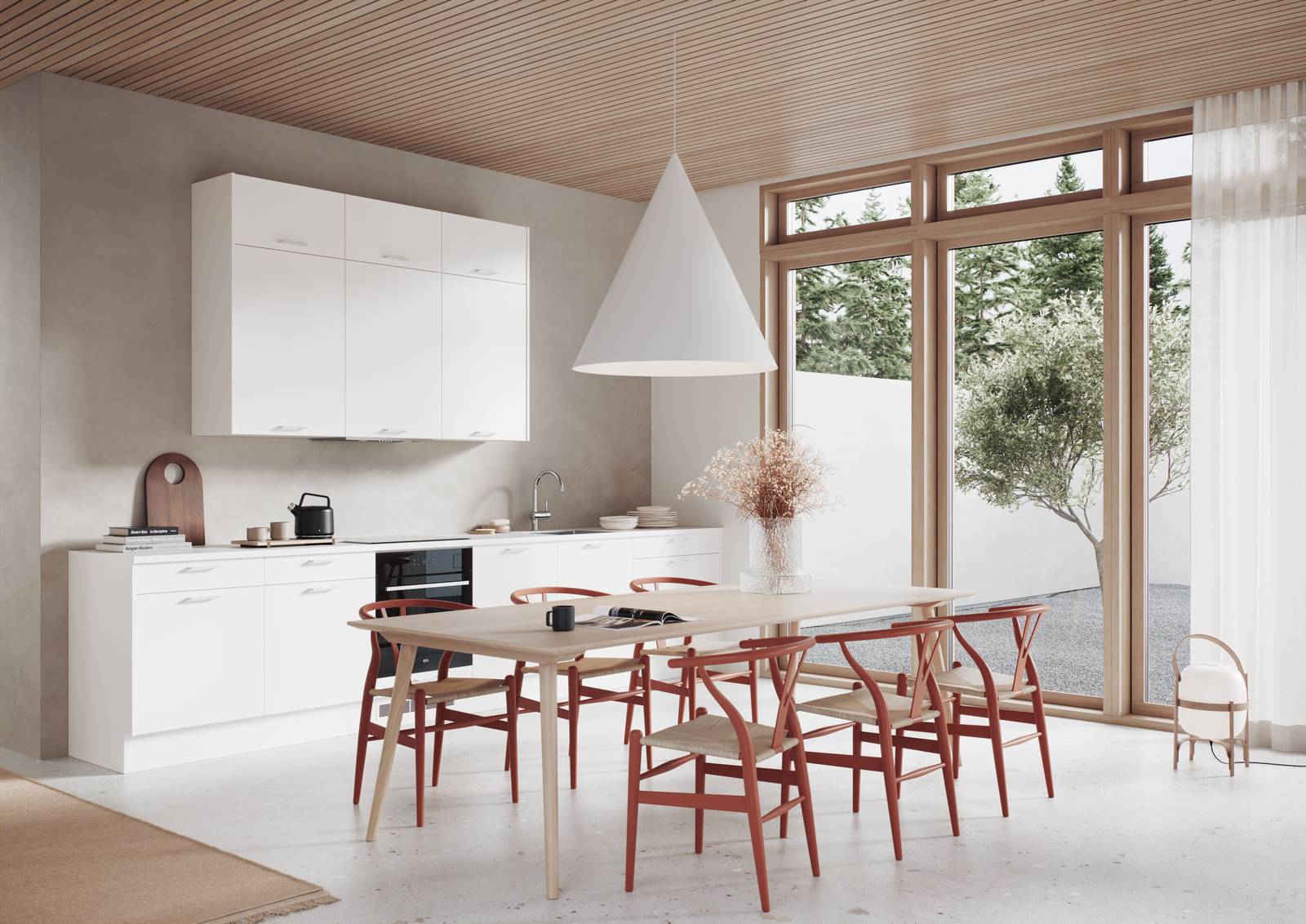 Modern kjøkken med slette og slitesterke melaminbelagte lys alm øverskap och hvite fronter, spisebord i lys tre og rød stoler.
