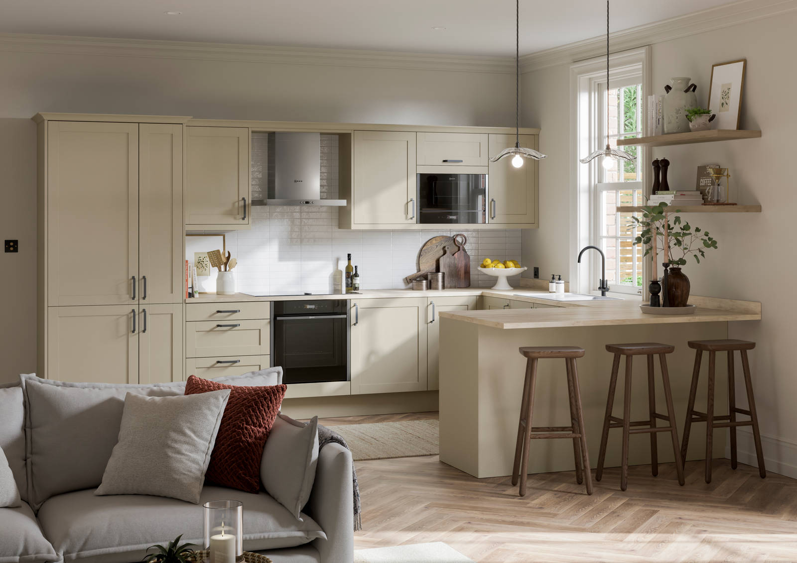 Tatton Sage from Magnet, a contemporary narrow frame shaker door, with a grey sofa in the foreground