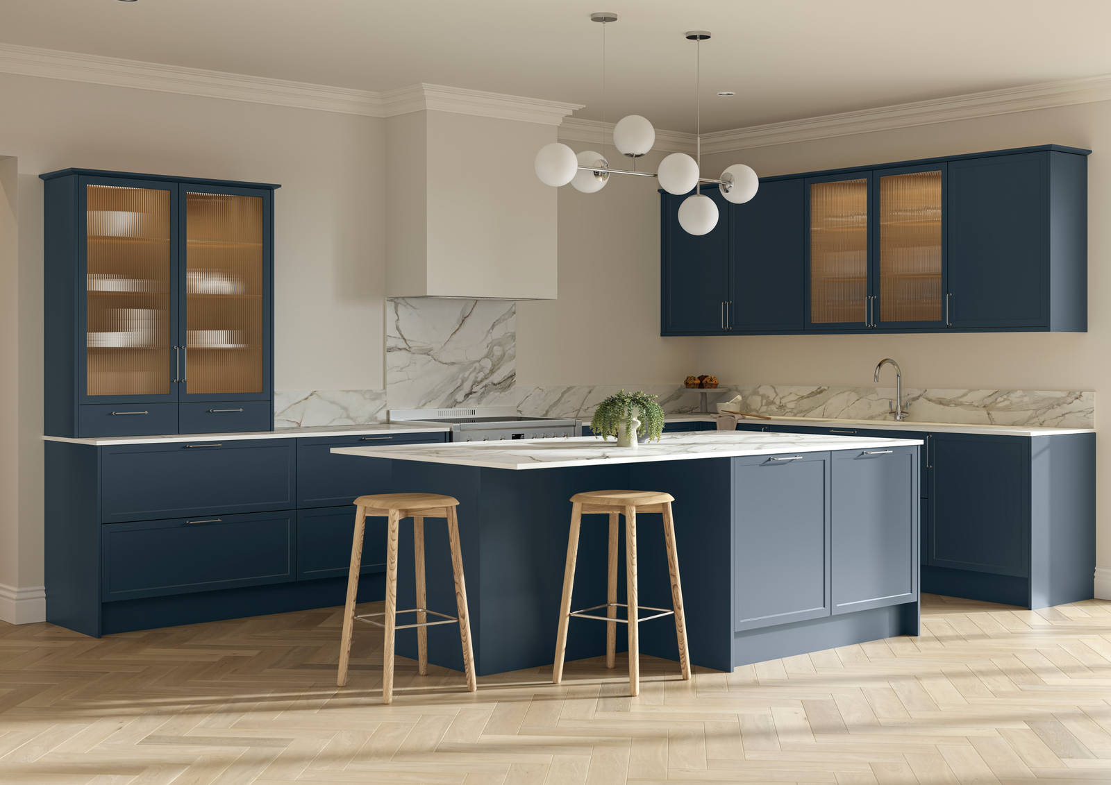 Modern Shaker kitchen Brunswick Voyage blue with white and grey marbled worktop and matching splashback, a kitchen island with breakfast bar and vitrine cabinets with fluted glass, and light wood herringbone flooring.
