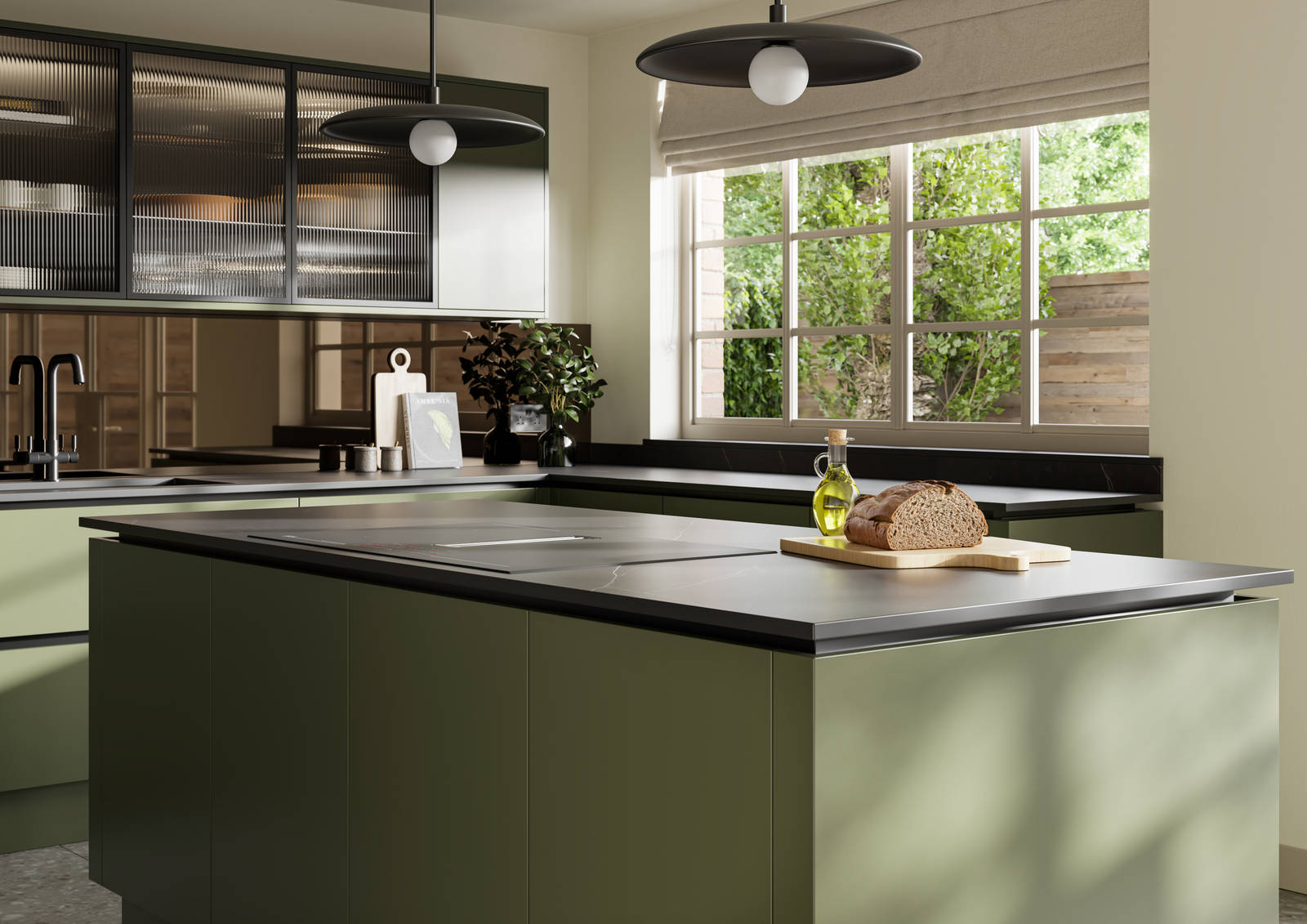 View over kitchen island in Integra Soho Tailored Green cabinetry, with Dekton worktop, fluted glass vitrine wall cabinets and large windows.