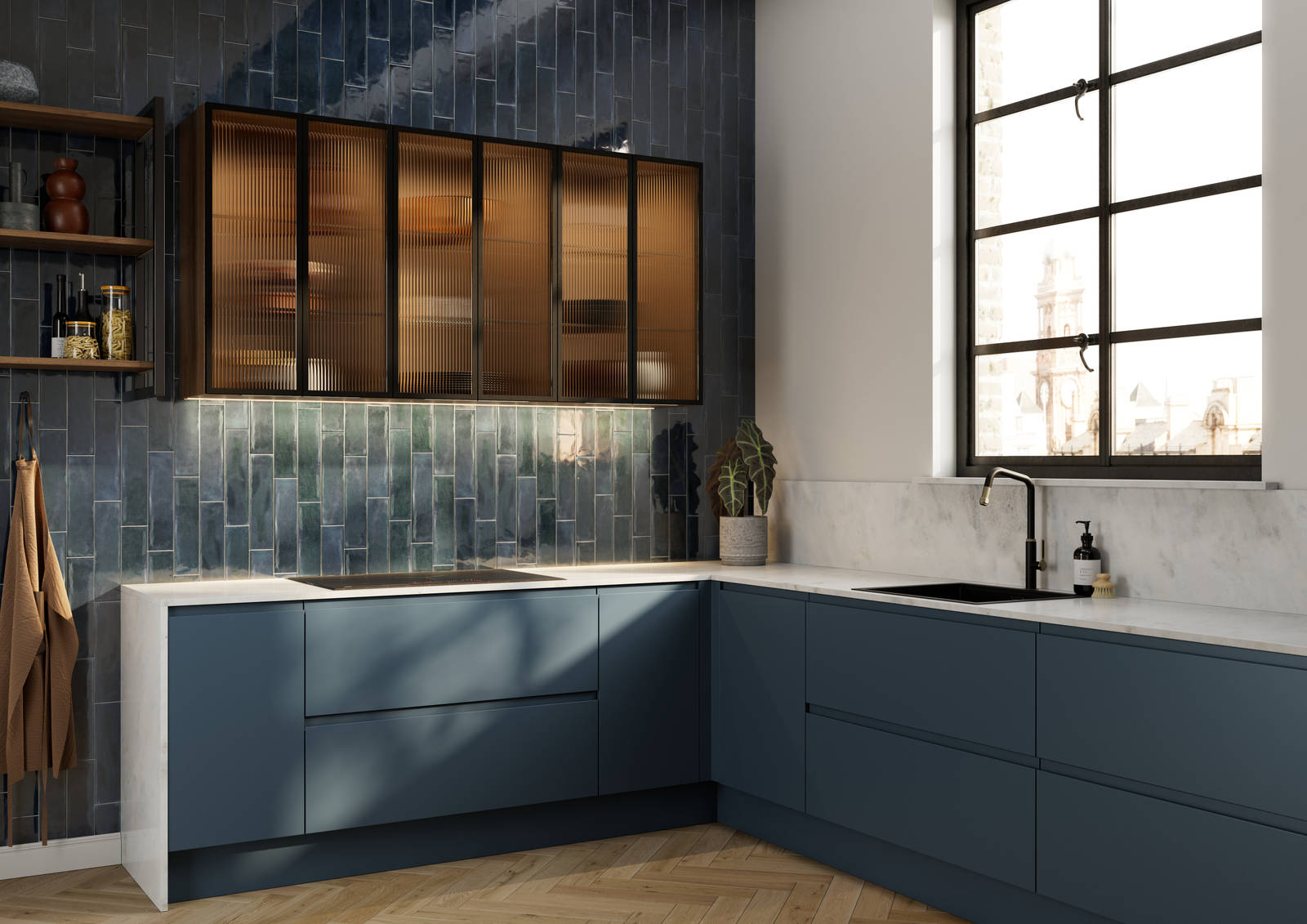 Contemporary and minimalist handleless kitchen with J-Pull door in dark blue shade Mineral Blue, with fluted glass vitrine wall cabinets and tiled wall.