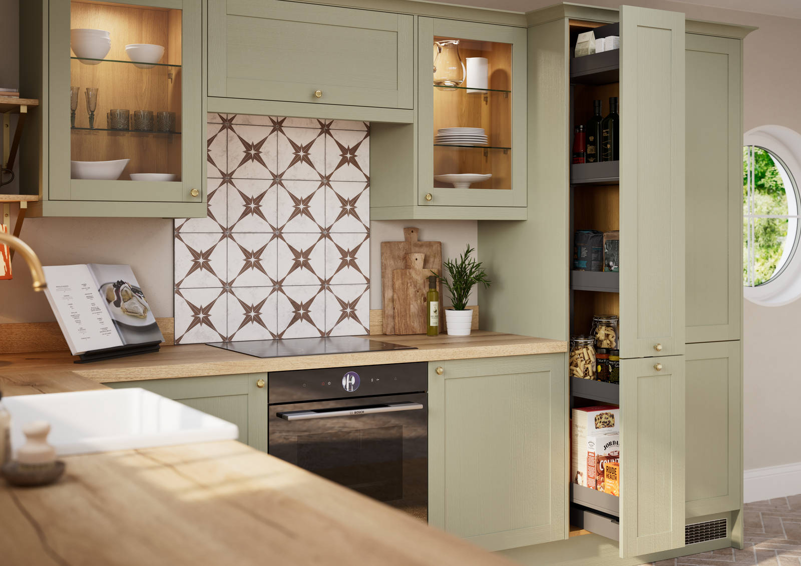 Opened pull-out larder in contemporary Shaker kitchen Ambleside from Magnet in sage green shade Meadow with belfast sink, aged taps and wooden effect worktop.