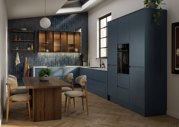 Contemporary and minimalist handleless kitchen with J-Pull door in dark blue shade Mineral Blue, with fluted glass vitrine wall cabinets and marbled worktop and matching upstand.