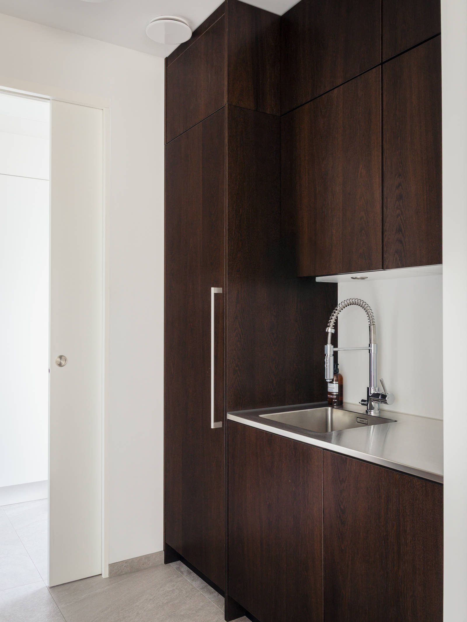 Next to the kitchen is the separate utility kitchen.