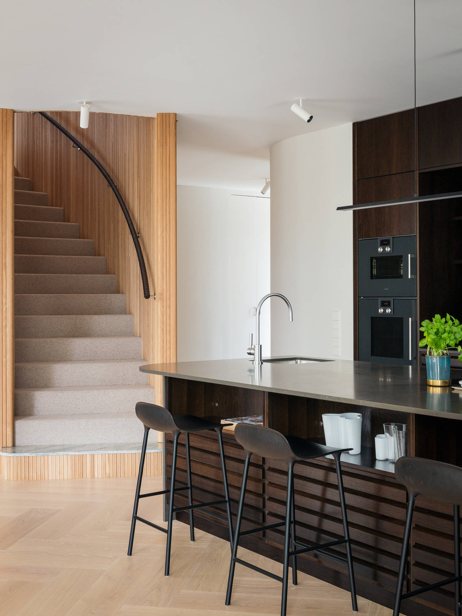 The house's geometric shapes are clearly experienced in the kitchen.