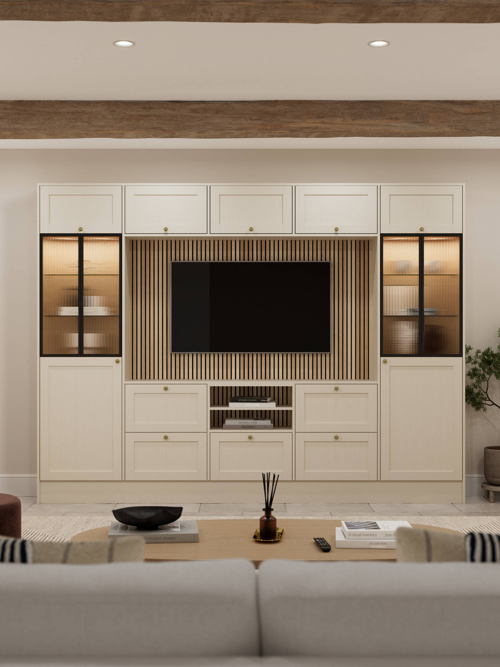 Media wall with Ambleside Shaker style cabinets, with sleek and modern frame width in the beige neutral cream shade Sand and fluted glass black aliminum framed vitrine.