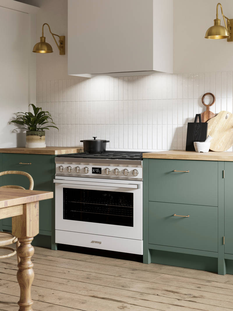 Soho Eucalyptus Green kitchen in charming contemporary cottage, a modern slab door with a painted rather than foil surface, for a truly premium look.