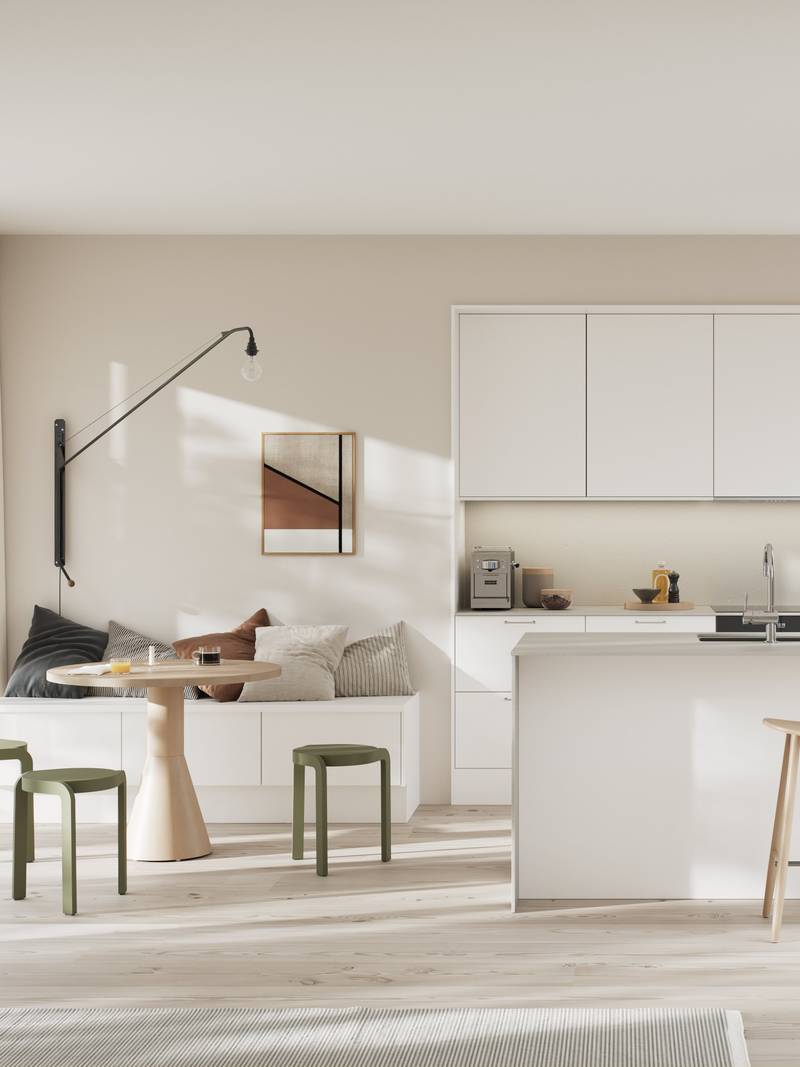 Moderne kjøkken i hvit høytrykkslaminat med betong laminatbenkeplate, stål håndtak, bardisk i kjøkkenøya med tre stoler og sittbenk i matchende skap med spisebord i lys tre