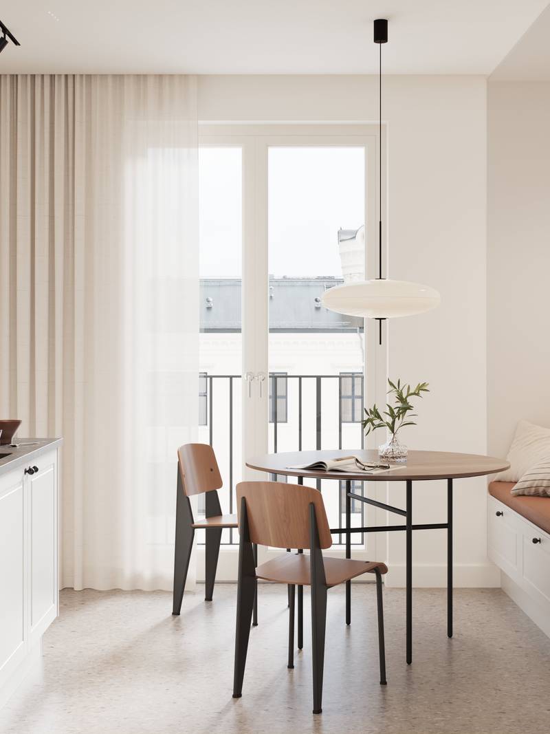 Valkoinen ajaton ja moderni keittiö jyrsityillä peilatuilla ovilla, jotka antavat keittiöön klassisia yksityiskohtia muuttumatta rustiikiksi, mustat nupit, musta hana ja musta pesuallas.