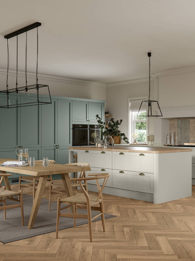 Ambleside Shaker kitchen in Moss and Limestone colours, featuring cup handles, and a spacious open-plan layout.