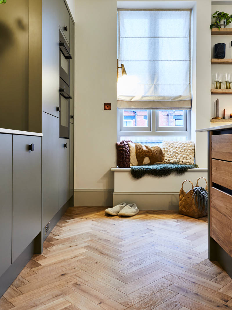 Modern slab Soho cabinets in the Balmoral colour, a soft beige green tone