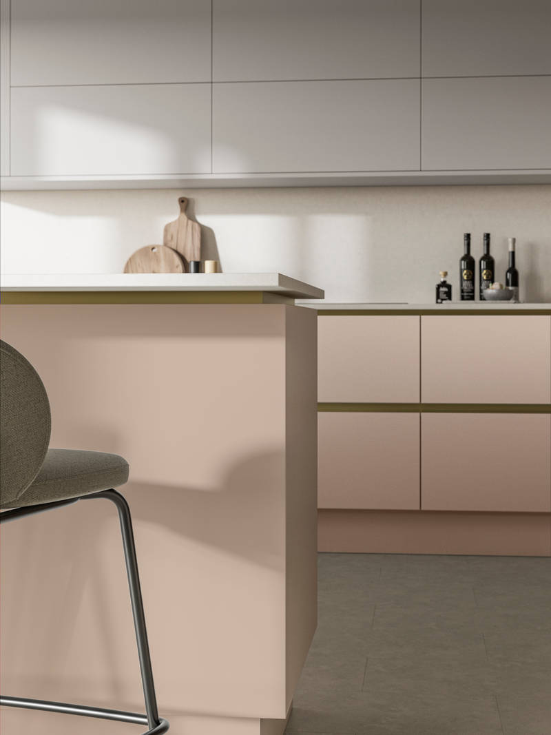 Modern and minimalist Integra Soho Chalk Blush kitchen, a frameless slab door with integrated handles in a smooth paint finish.
