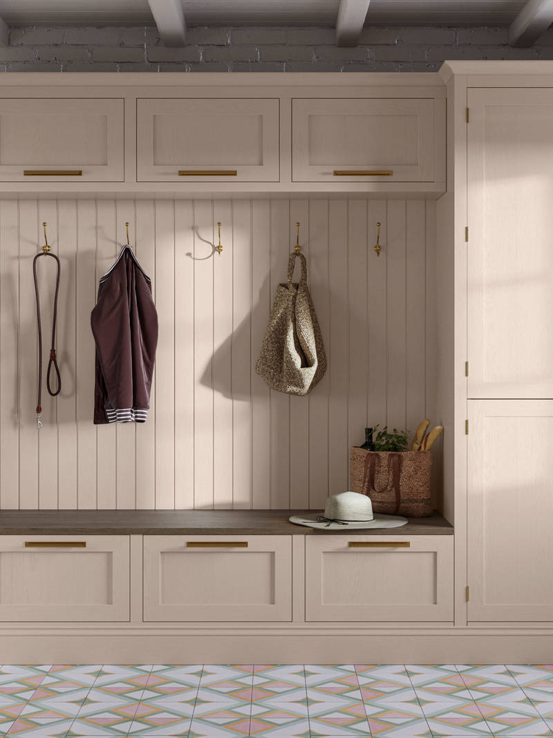 Entrance hallway with Magnet Wardley cabinetry, wall panel, top cabinets and seating bench with large drawers, all matching in the warm light beige shade Shell.