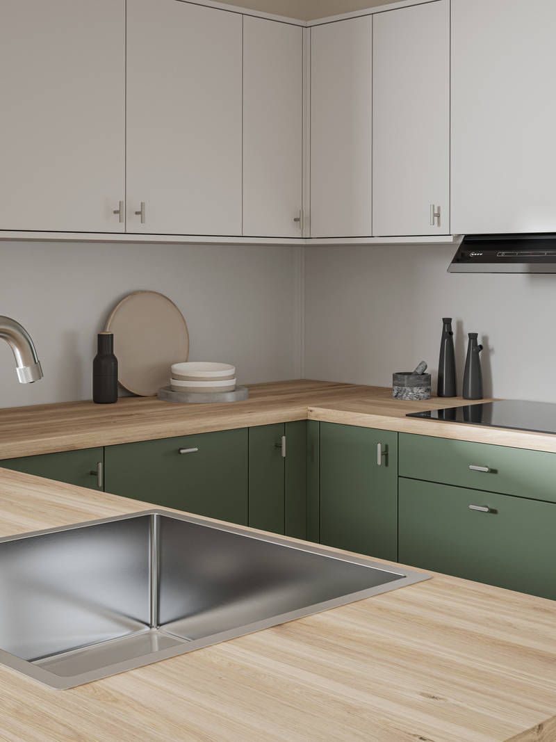 Oak laminate worktop in contemporary scandi influenced Ascoli Woodland and light grey kitchen, with a steel sink and tap and knurled brushed nickel t-bar knobs.