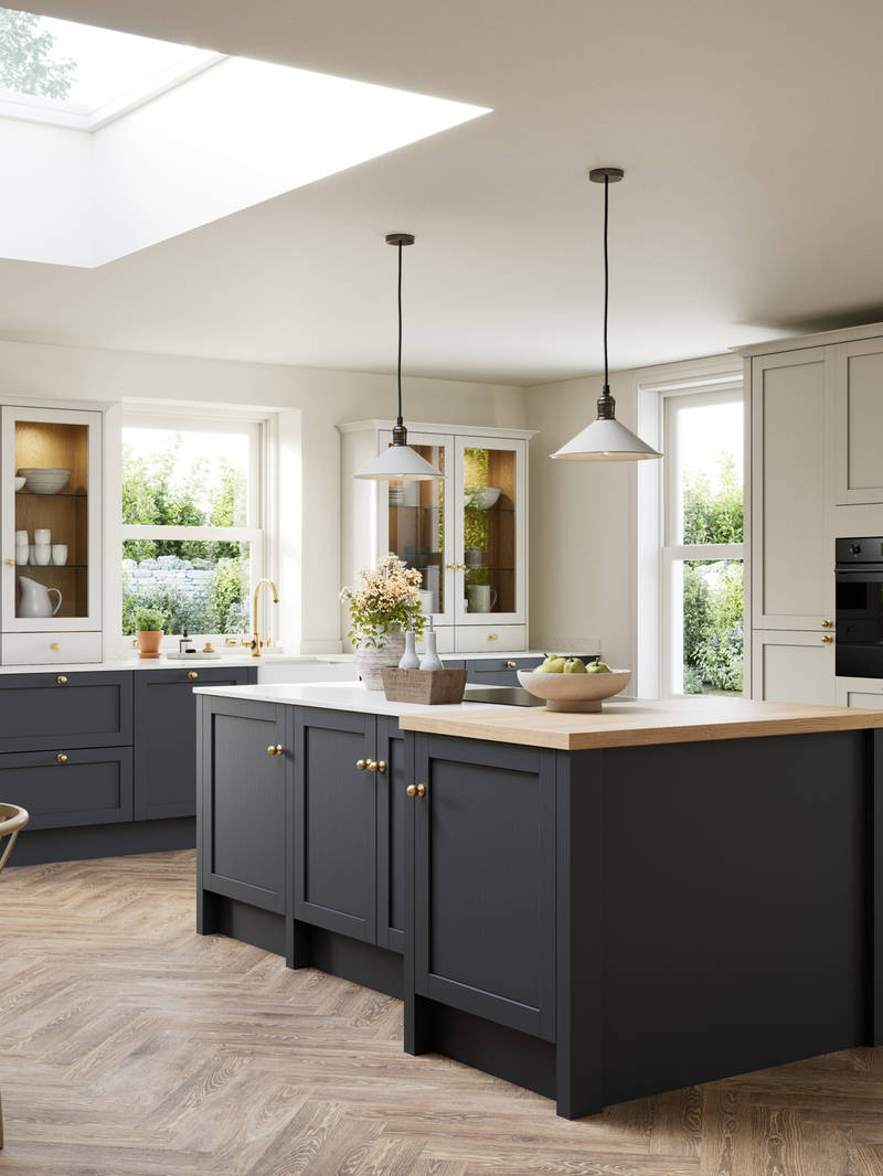 Contemporary Shaker kitchen island Ambleside from Magnet in deep blue shade Lake with beige tall cabinets, herringbone wood flooring and wood diningroom table