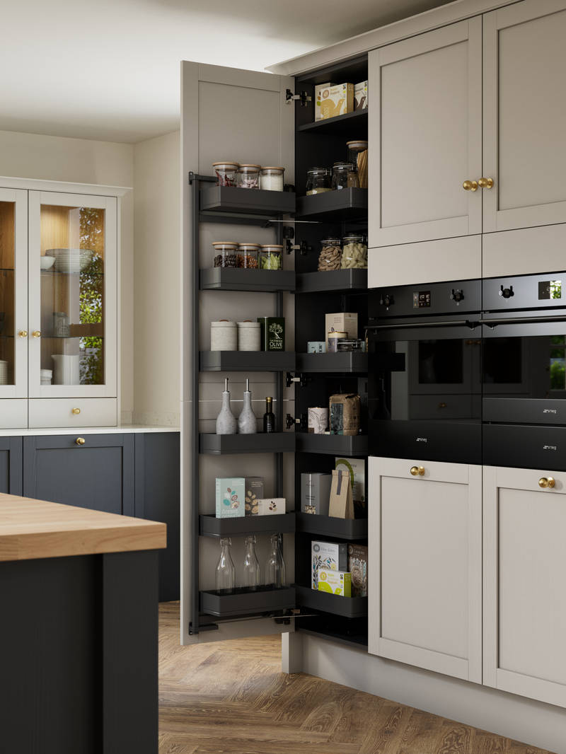 Contemporary Shaker kitchen island Ambleside from Magnet in deep blue shade Lake with beige tall cabinets, herringbone wood flooring and wood diningroom table