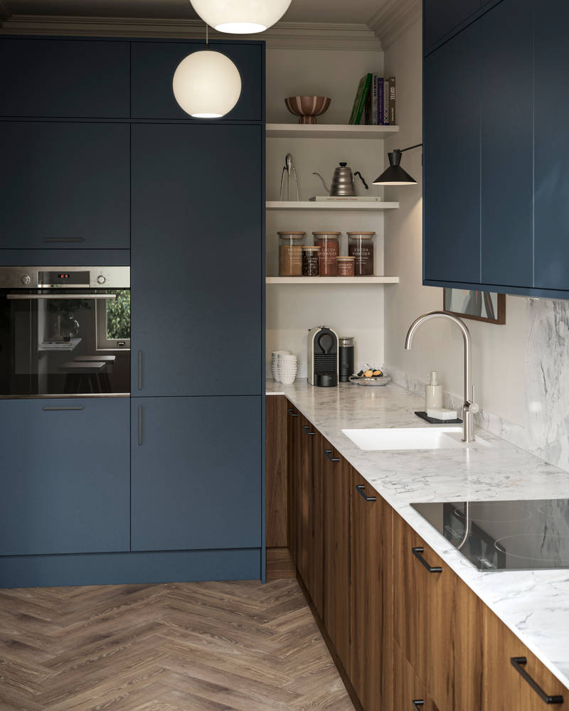 Contemporary Ascoli Mineral Blue tall cabinets and wall cabinets over Portobello Umbra kitchen cabinets with marbled compact laminate worktop, black handles and Amtico smouldered oak herringbone flooring.