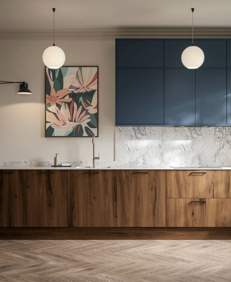 Contemporary Ascoli Mineral Blue tall cabinets and wall cabinets over Portobello Umbra kitchen cabinets with marbled compact laminate worktop, black handles and Amtico smouldered oak herringbone flooring.