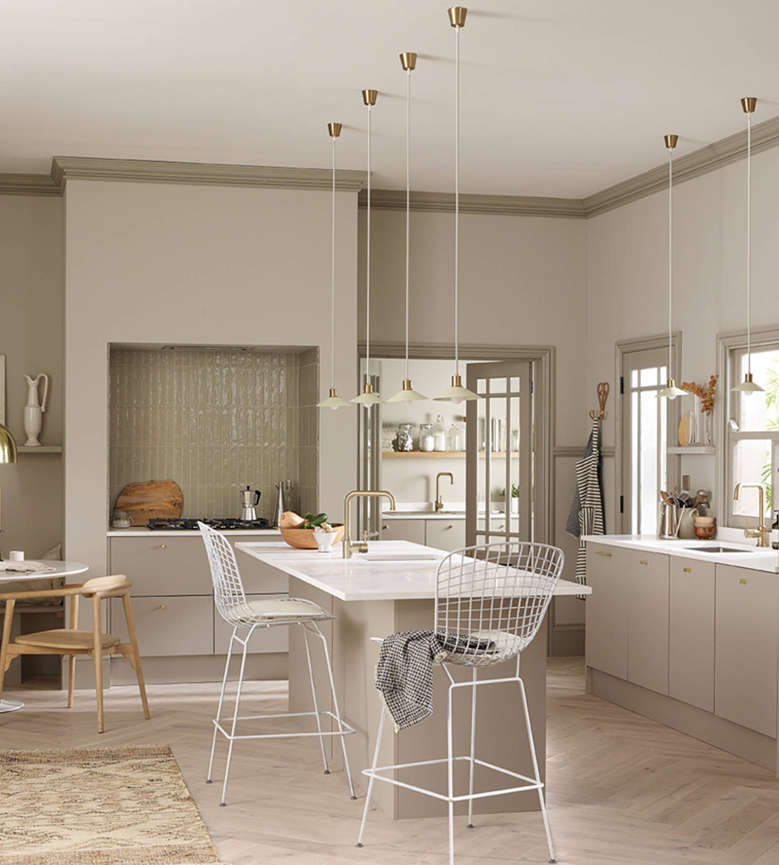 Hoxton kitchen. Smooth slab doors in a painted effect finish. Minimalist styling with your choice of handles and three colours.