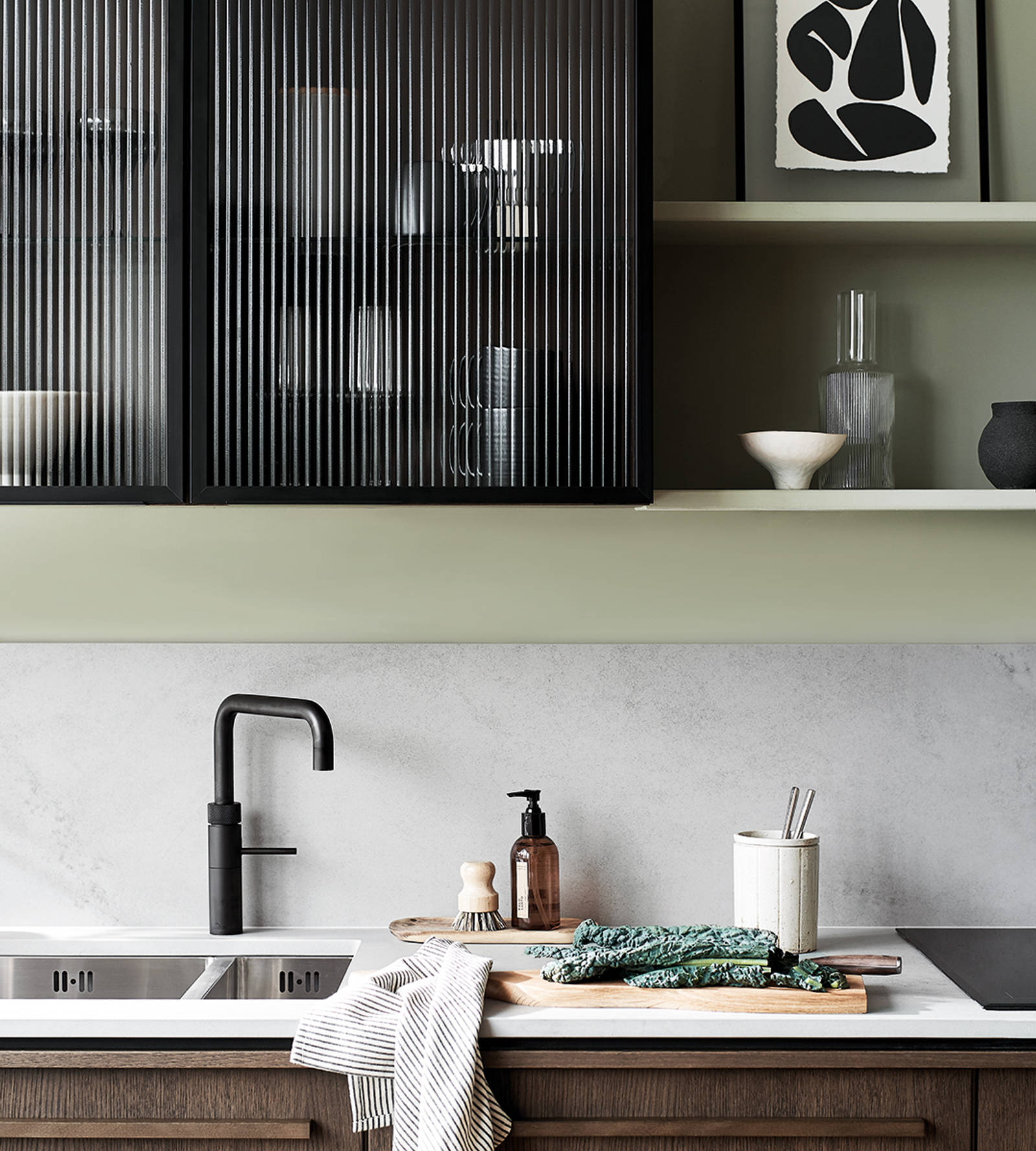 Nordic Nature. Modern wooden kitchen design with a Nordic influence. Featured floating worktops, a ribbed plinth and rounded end panels.