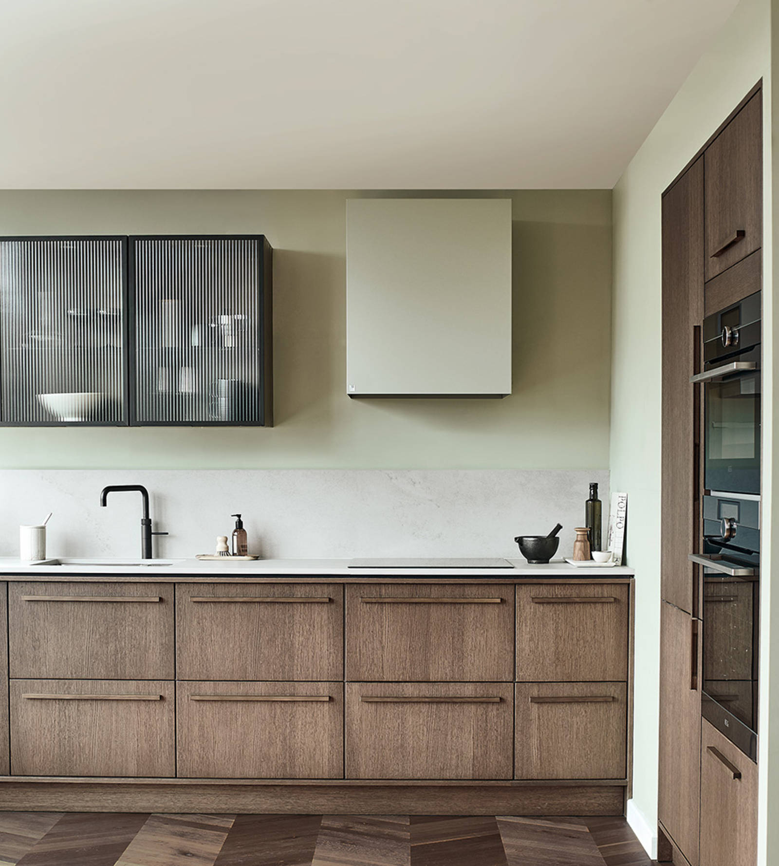 Nordic Nature. Modern wooden kitchen design with a Nordic influence. Featured floating worktops, a ribbed plinth and rounded end panels