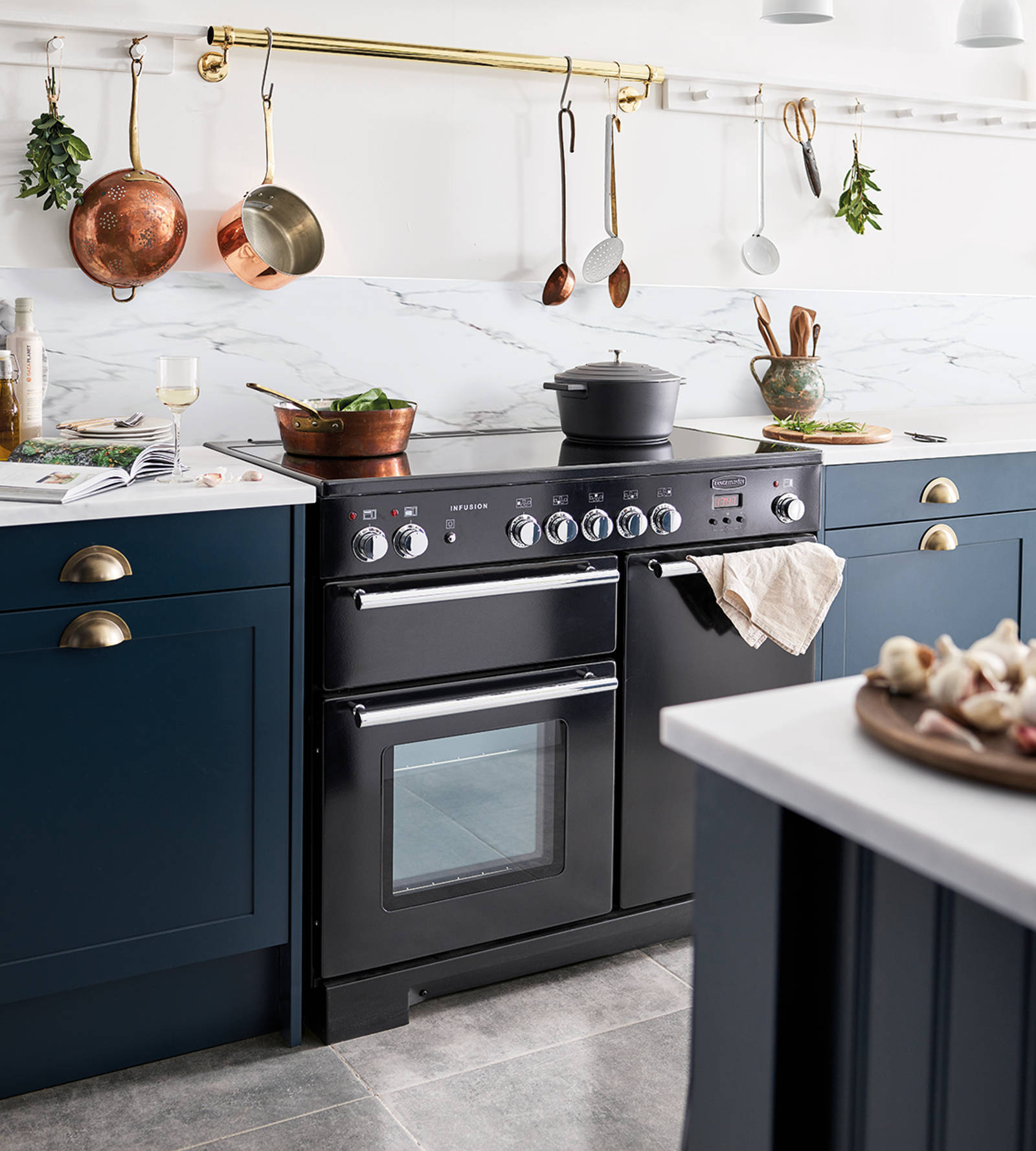 Black Range cooker in dark blue DUnahm ktichen from Magnet