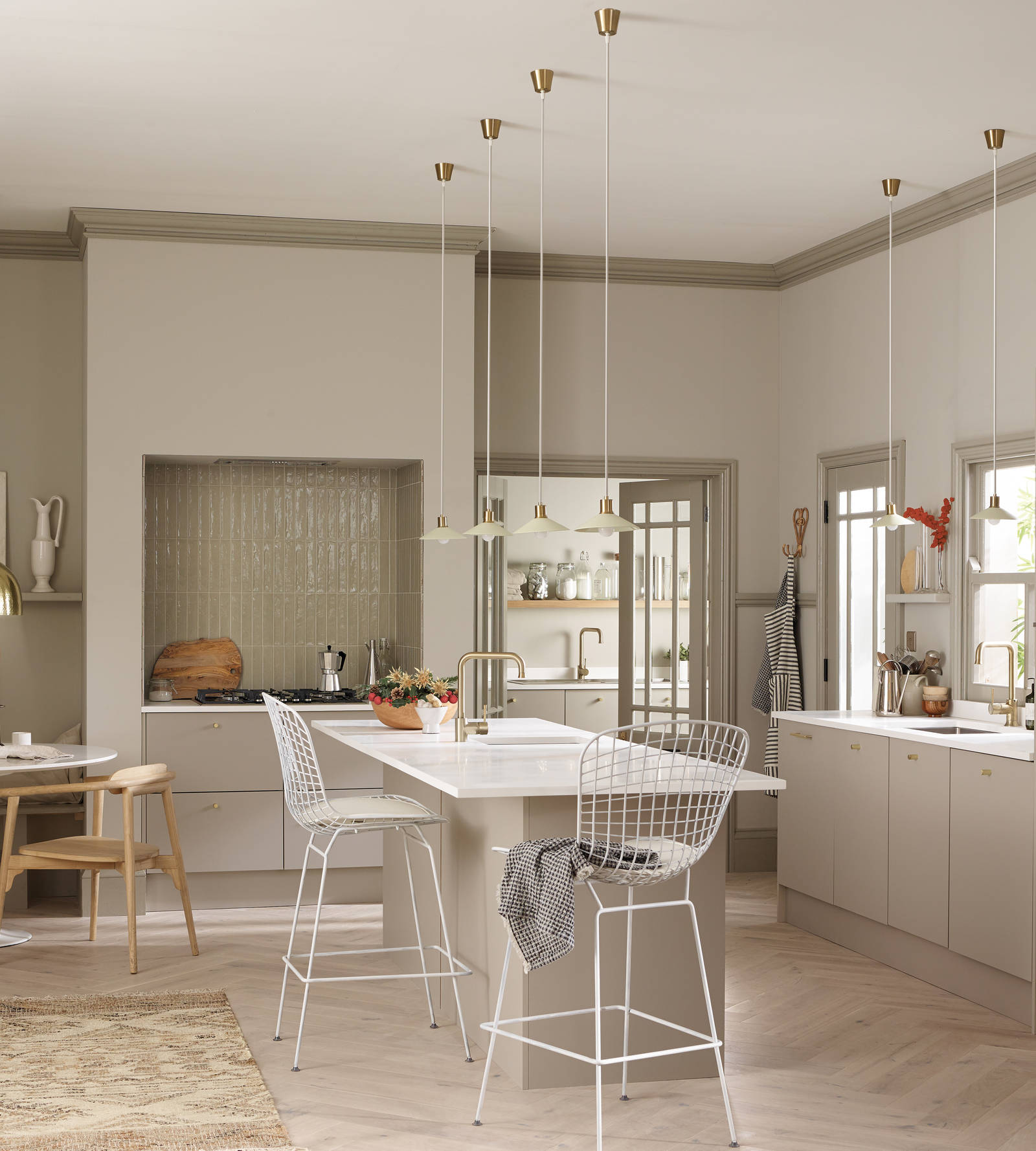 Hoxton kitchen. Smooth slab doors in a painted effect finish. Minimalist styling with your choice of handles and three colours.