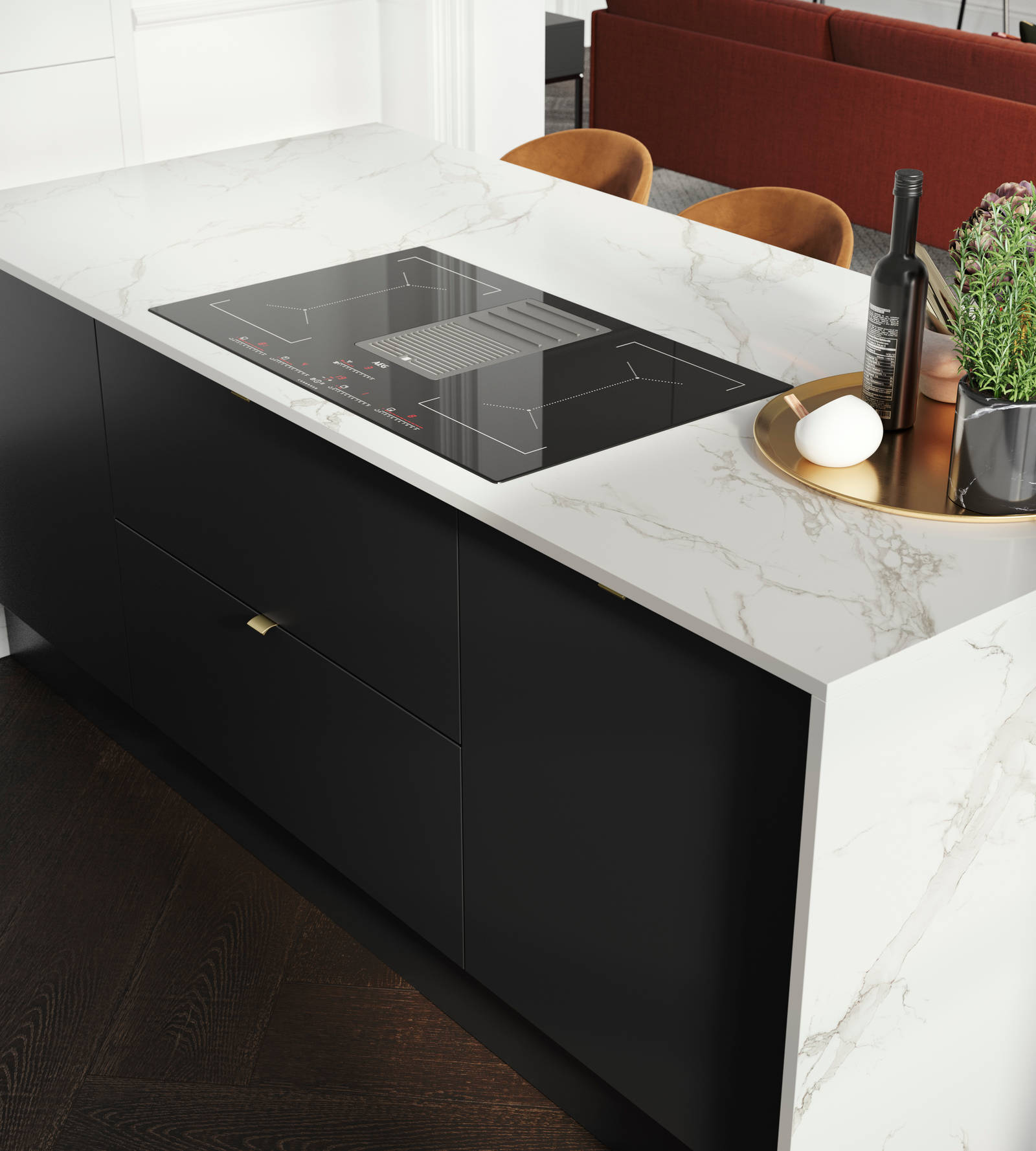 Overhead view of kitchen island, covered with marbled decor side in Magnet's minimal maximalism Hoxton kitchen in Sumi Black.