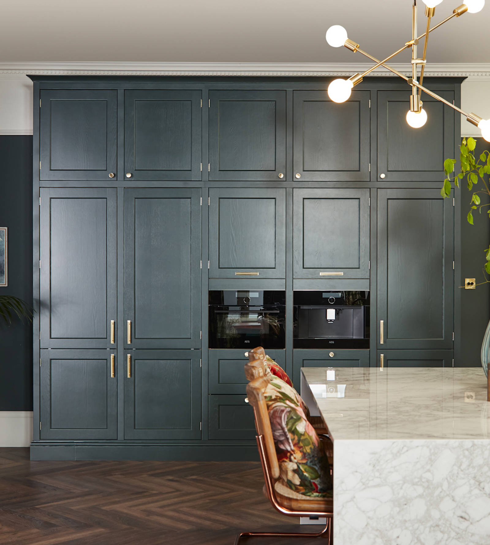 Ludlow, a traditional Shaker-style kitchen range in the shade Arboretum Green, tall cabinets