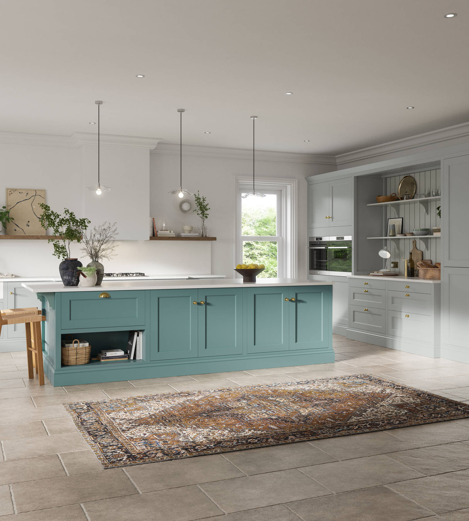 Traditional Shaker-style kitchen range in light grey with a blue kitchen island.