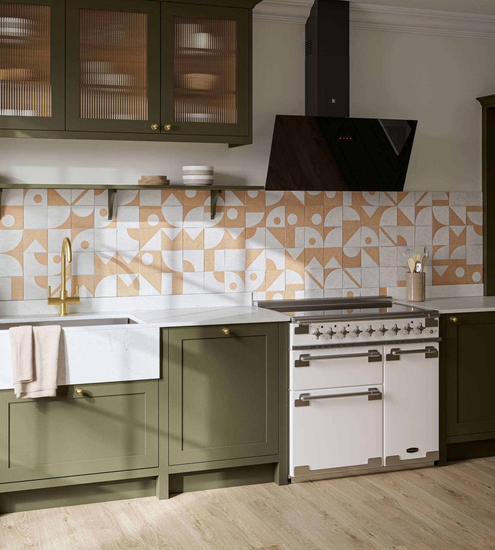 Premium Shaker kitchen Wardley Tailored green with traditional detailing, brass accessories, Elise range oven, screen extractor, white worktop and Classic Flint Grey oiled oak engineered wood flooring.