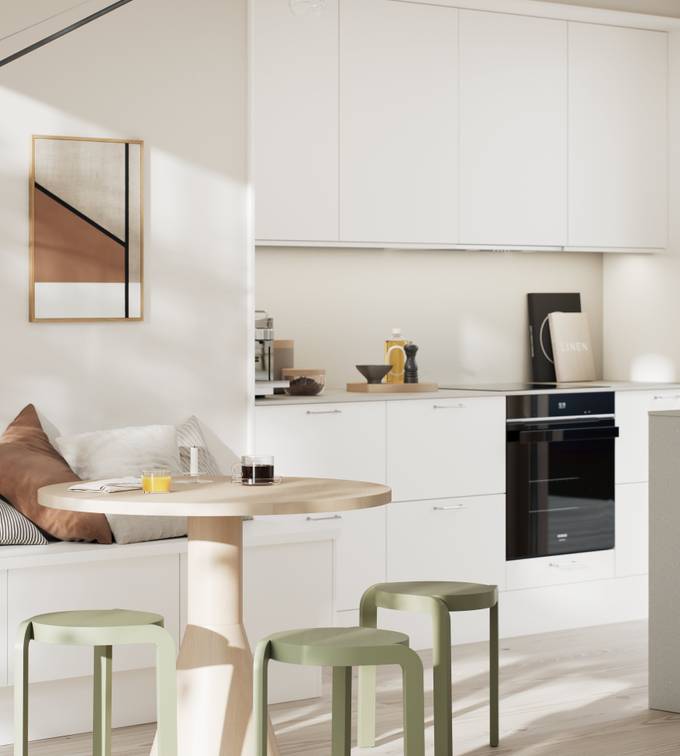 Moderne kjøkken i hvit høytrykkslaminat med betong laminatbenkeplate, stål håndtak, bardisk i kjøkkenøya med tre stoler og sittbenk i matchende skap med spisebord i lys tre