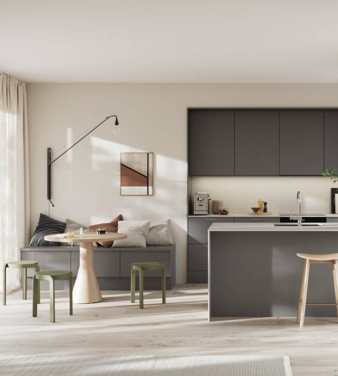 Moderne kjøkken i mørk grå høytrykkslaminat med betong laminatbenkeplate, stål håndtak, bardisk i kjøkkenøya med tre stoler og sittbenk i matchende skap med spisebord i lys tre