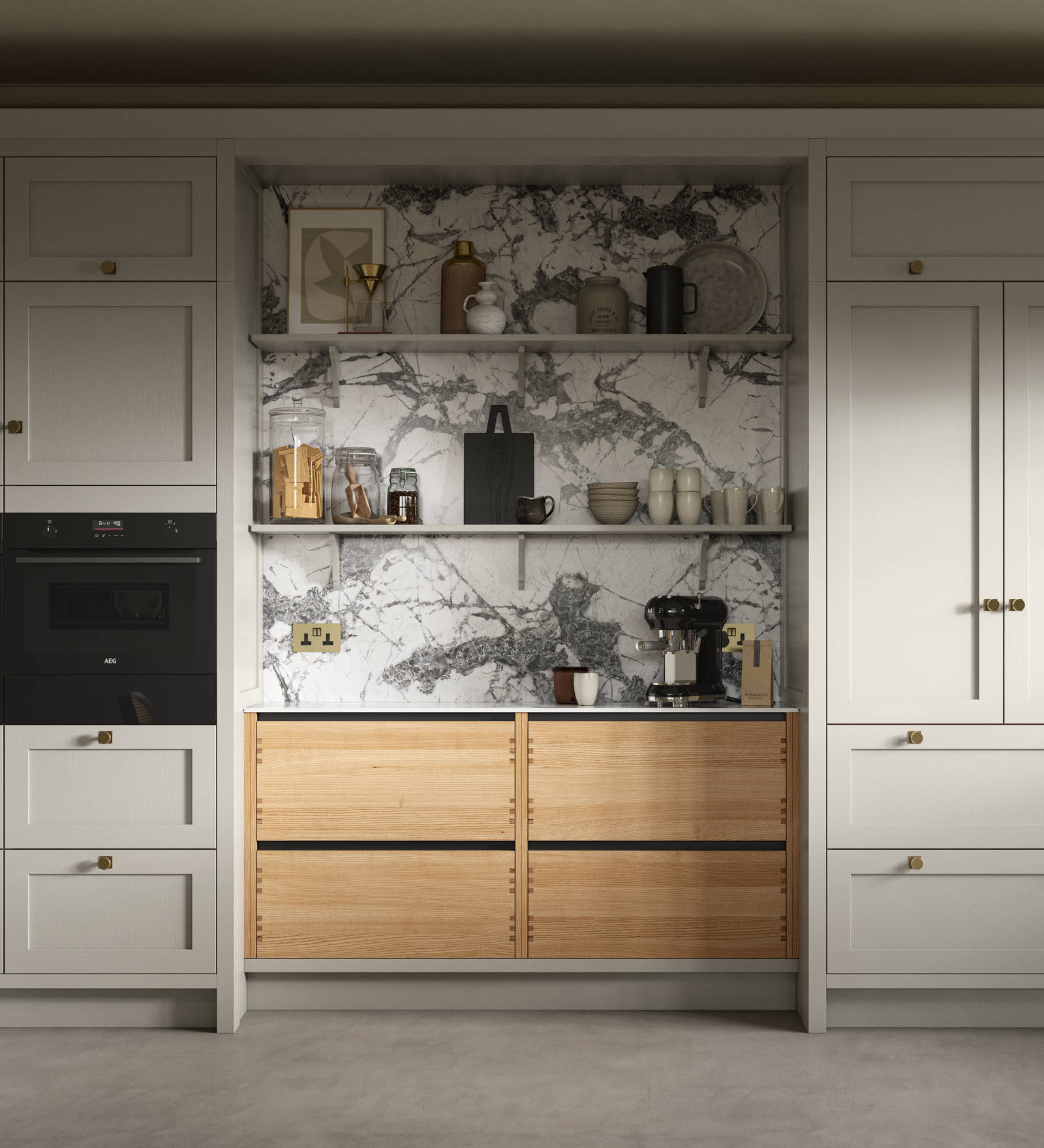 A neutral Shaker kitchen with Pebble and Nordic Craft cabinetry, marble splashback behind open shelves and paired with brass handles.