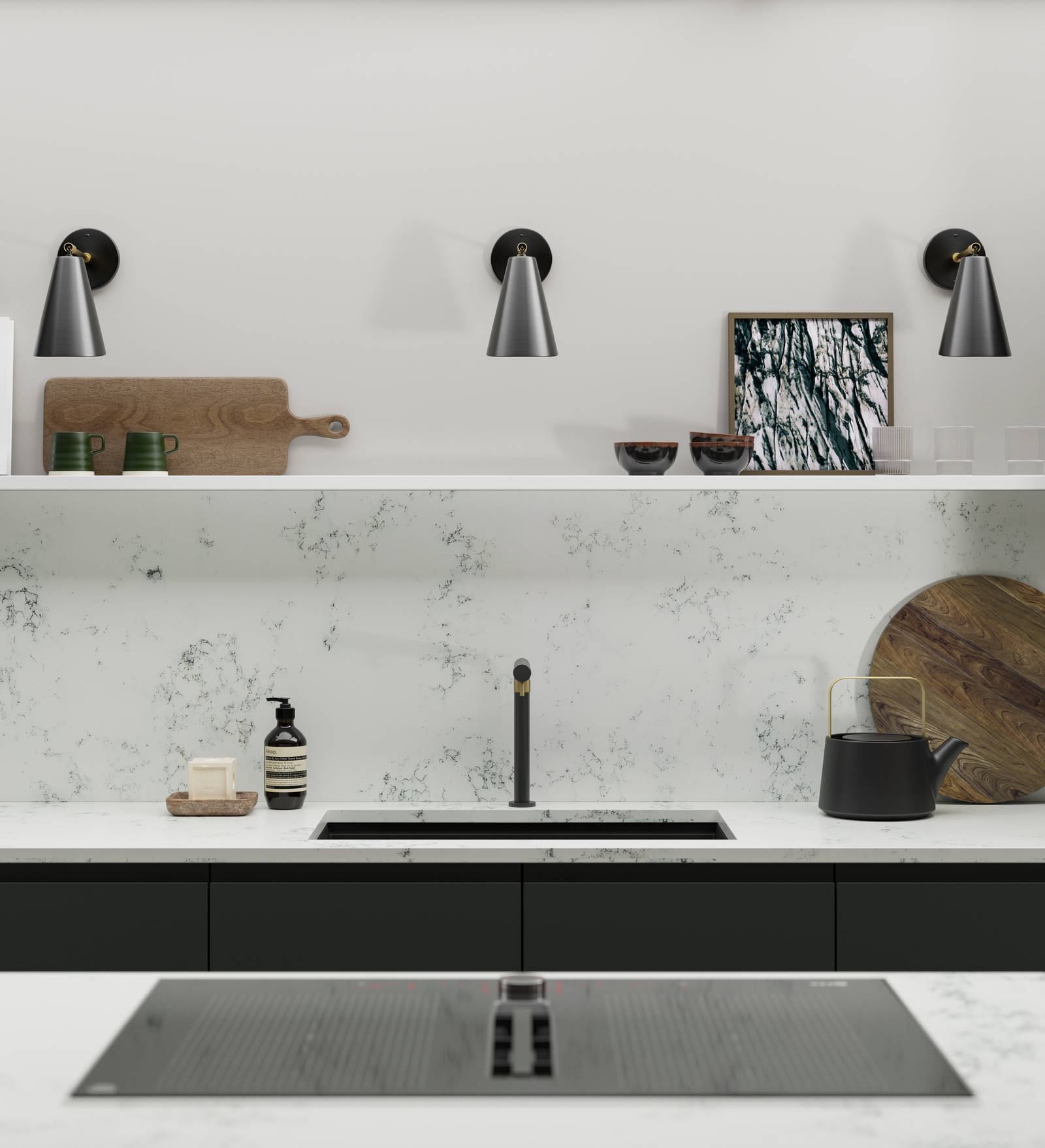 A Duxbury kitchen sink set up featuring marble-effect worktops and backsplash, black sink and tap and open shelving with wall lights and accessories.