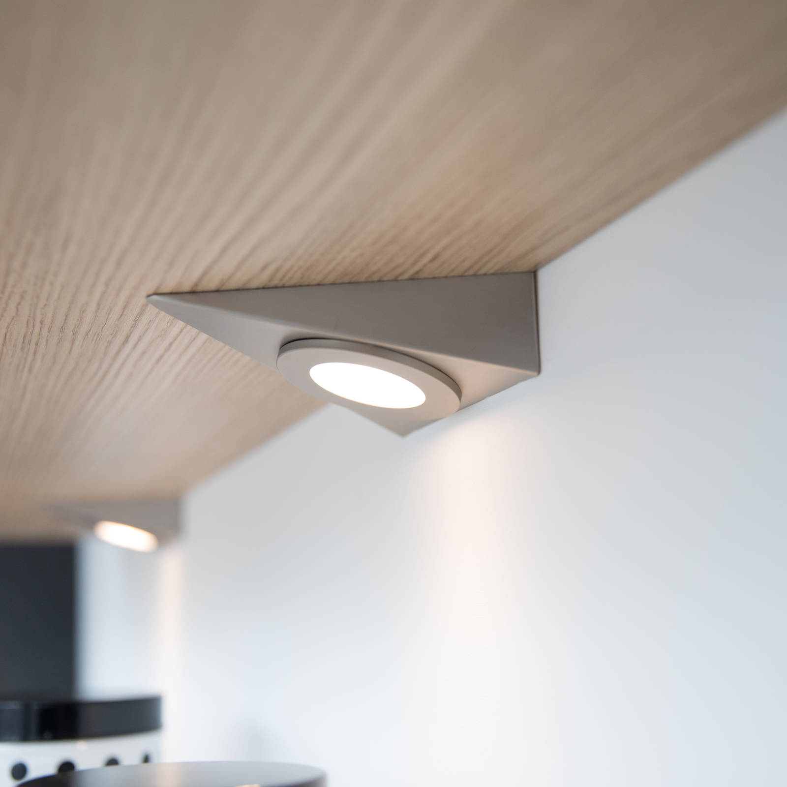 Lighting under wall shelf