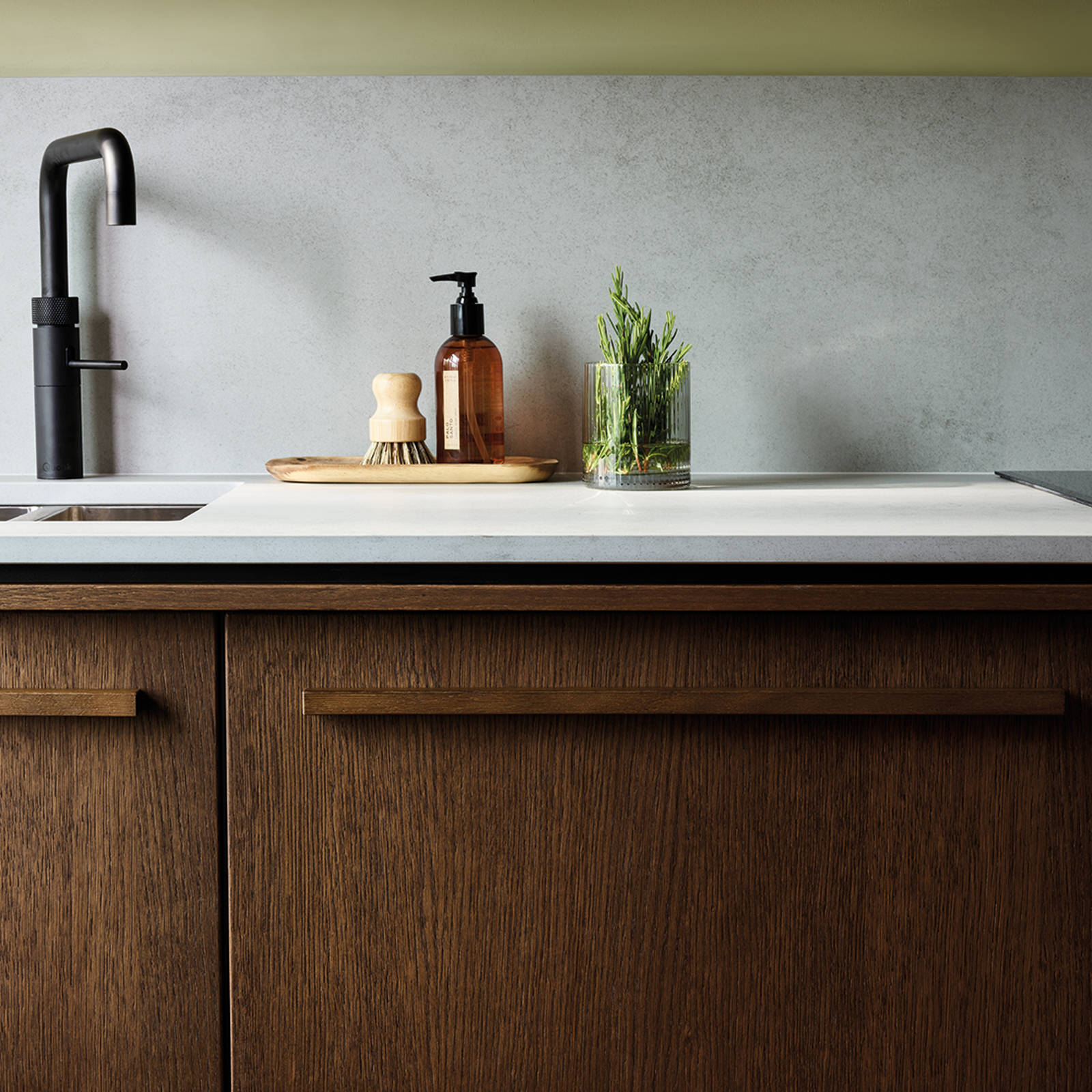 Nordic Nature. Modern wooden kitchen design with a Nordic influence. Featured floating worktops, a ribbed plinth and rounded end panels.