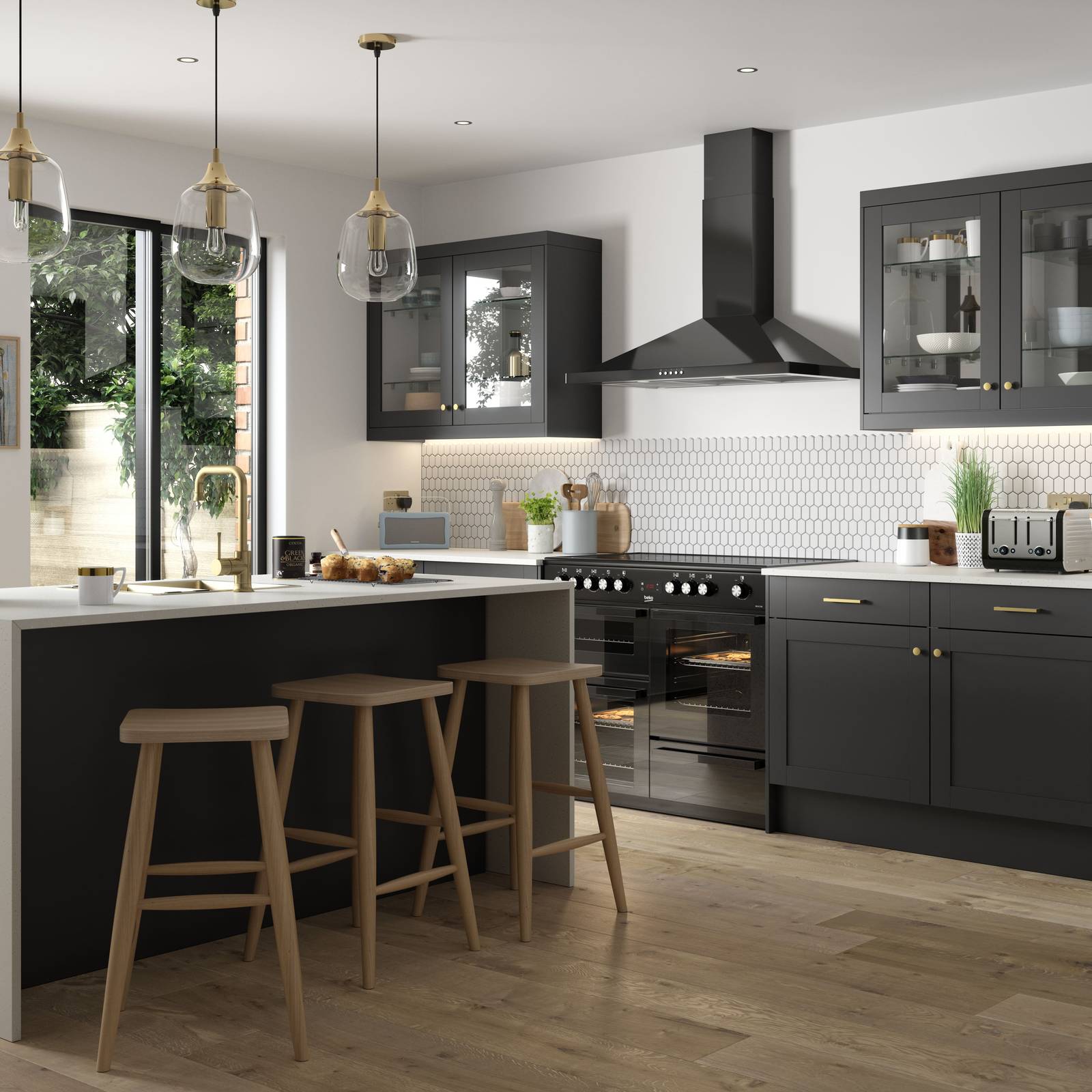 Tatton Graphite kitchen from Magnet, a contemporary dark grey narrow frame shaker door with a kitchen island featuring bar stool seating.