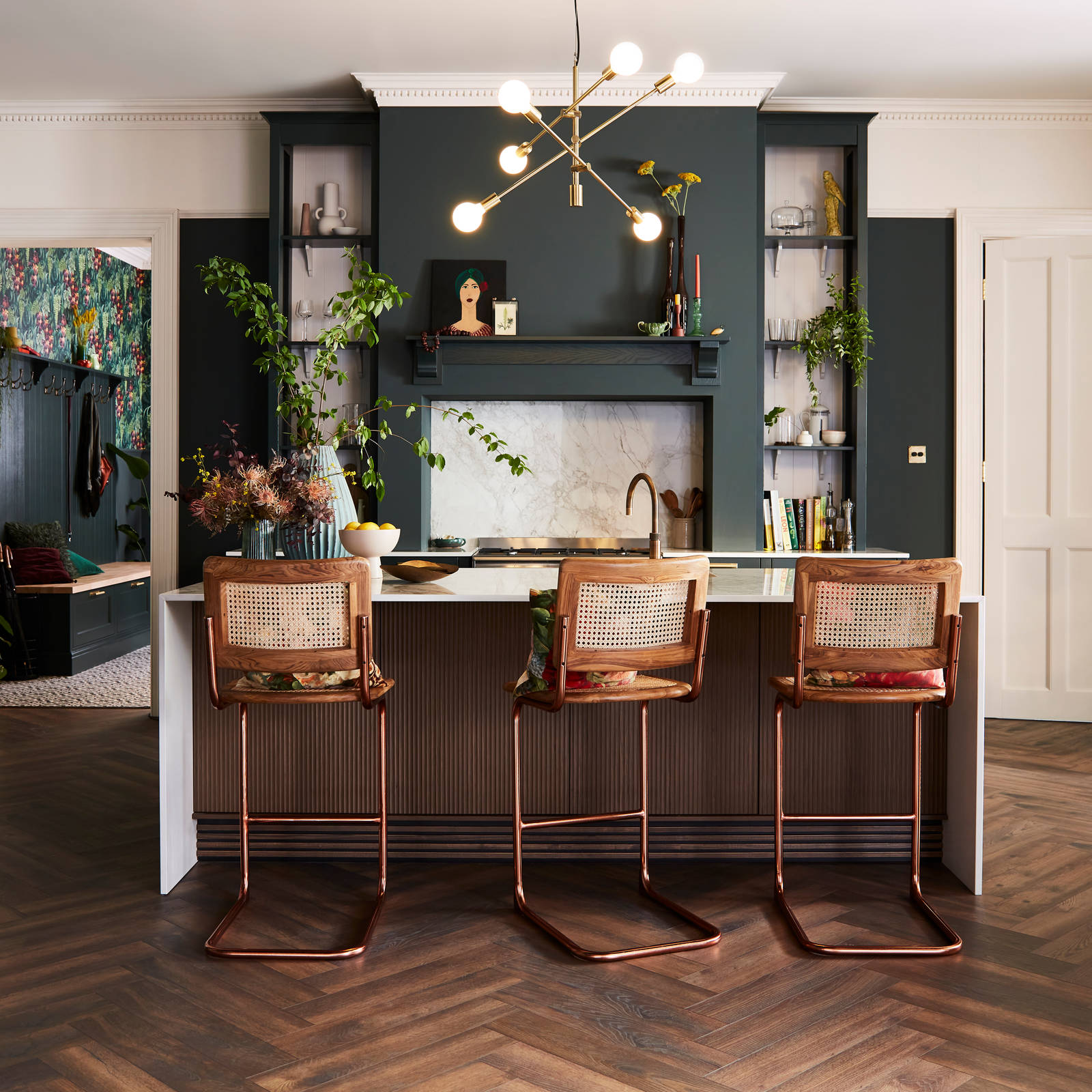 Ludlow Arboretum kitchen with brass and wood barastools in an open plan layout