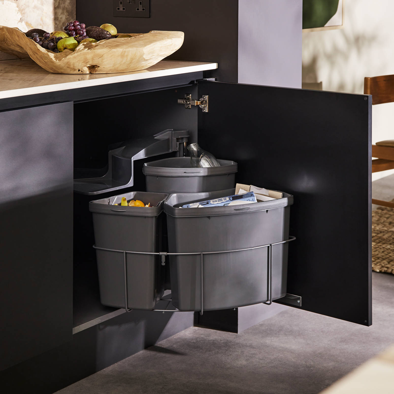 Interior of Hoxton Sumi Black cabinetrywith waste sorting bins.
